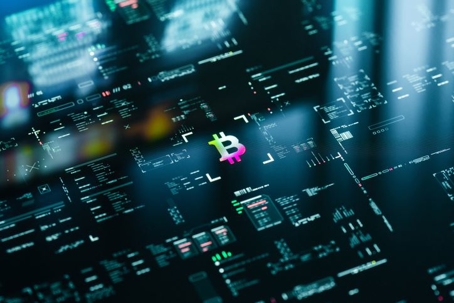 Bitcoin logo on data screen