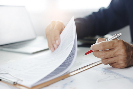 person reviewing documents