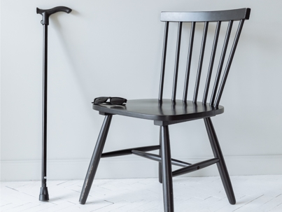 Chair with cane and glasses