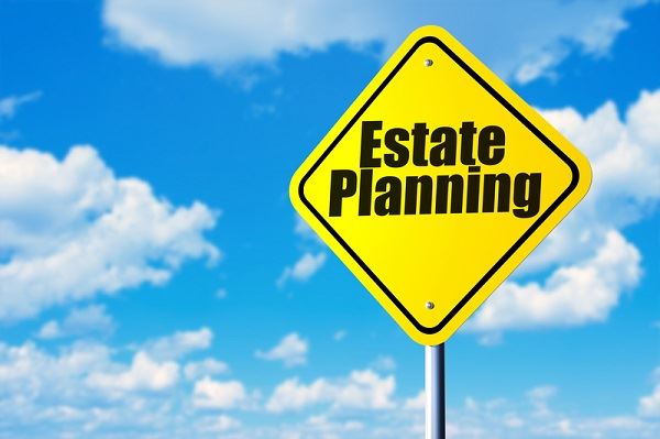 Yellow diamond sign that says estate planning