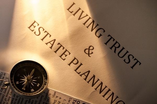 Papers that say "Living Trust & Estate Planning"